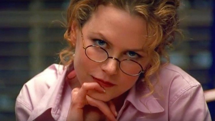 The “Kubrick Stare”: when his characters look directly at the camera with head tilted slightly down—as Nicole Kidman does in this shot from  Eyes Wide Shut  (1999)